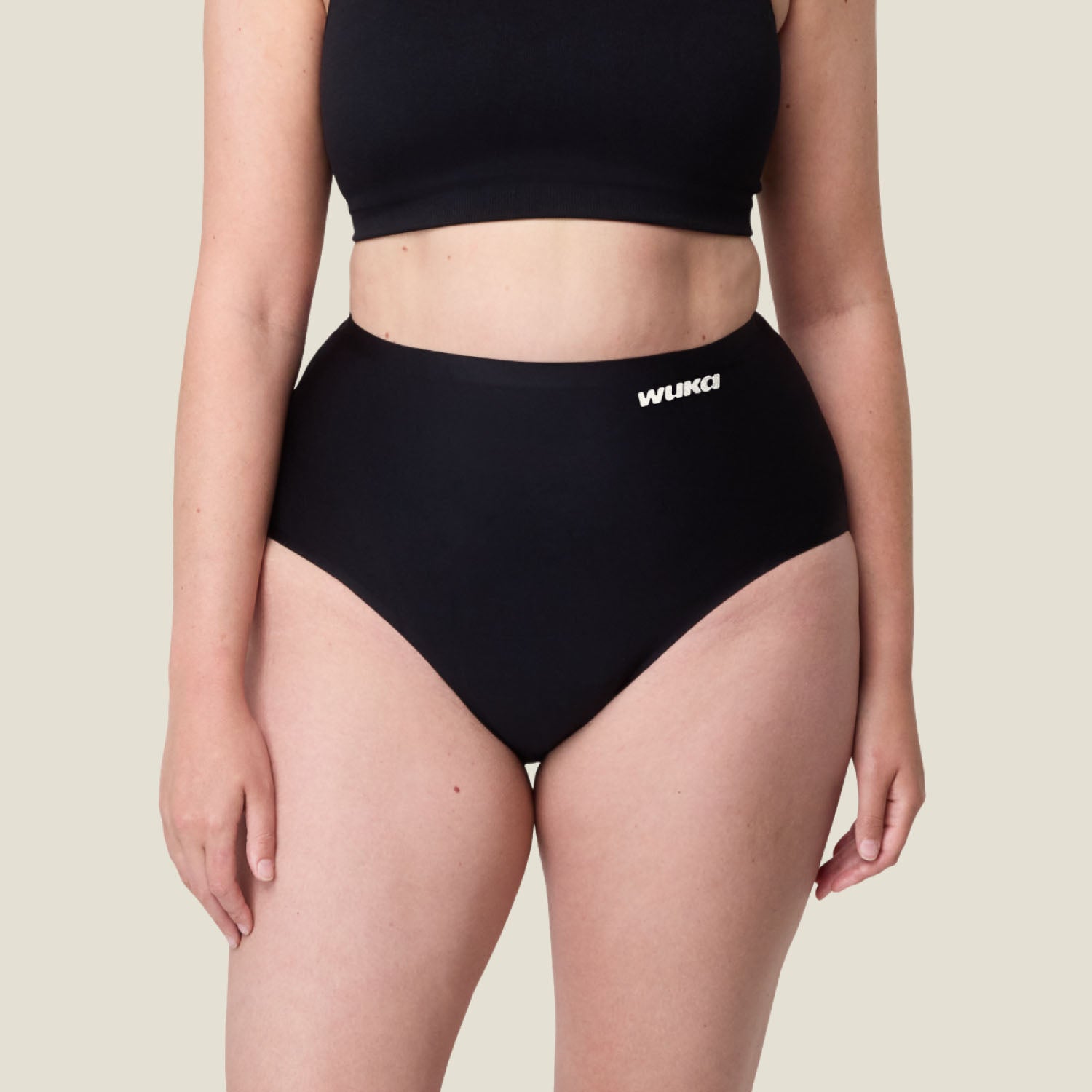 Close-up of WUKA High Waist Period Pants in black, designed for super heavy menstrual flow with leak-proof protection for up to 12 hours.