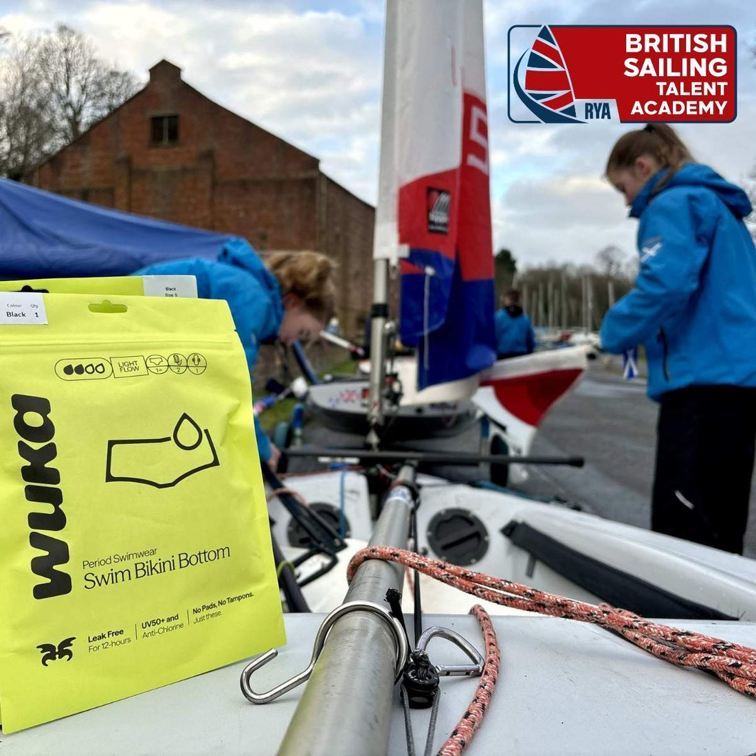 WUKA period swimwear on display at a British Sailing Talent Academy event, supporting young female sailors with leak-free, period-proof gear on the water.