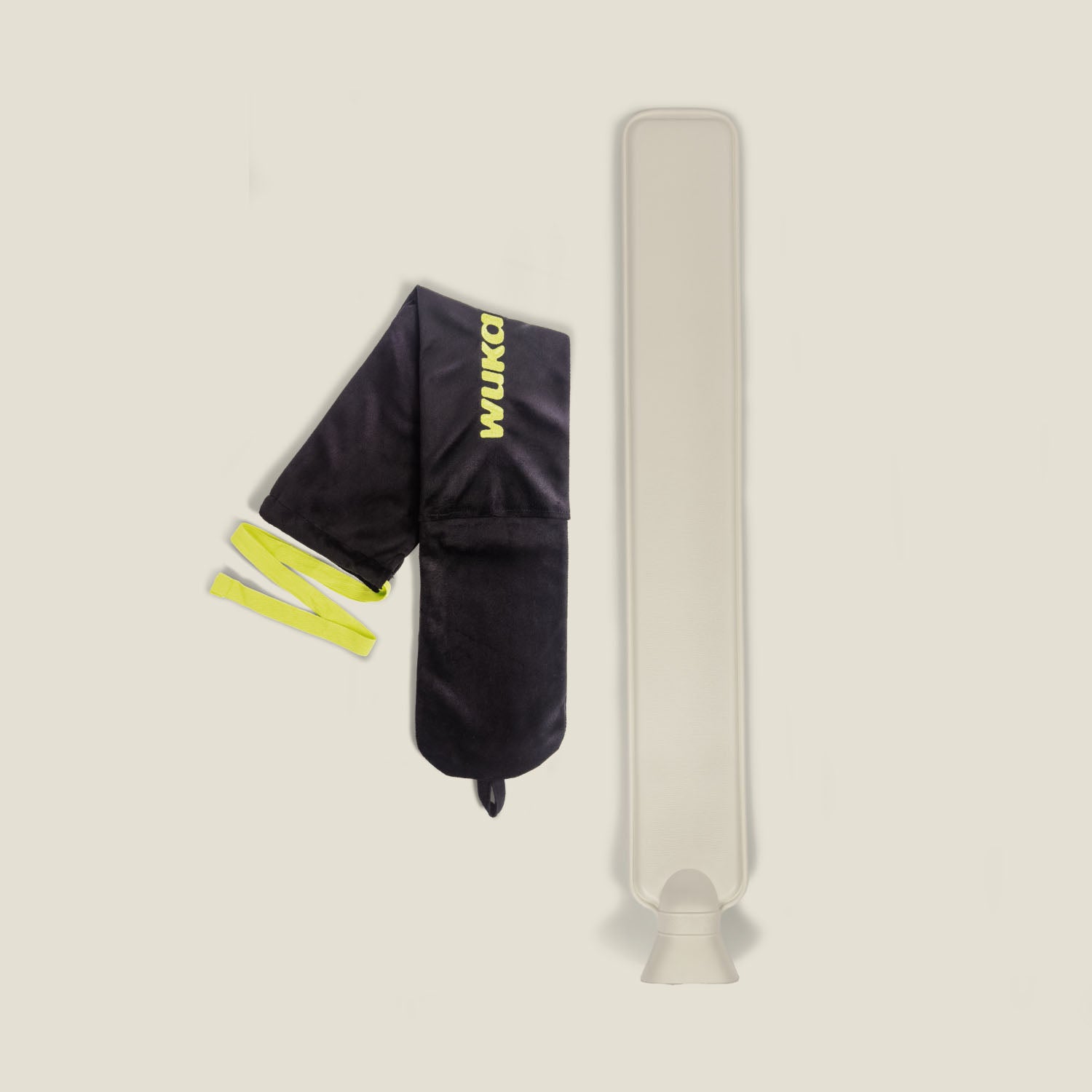 WUKA’s long hot water bottle shown alongside removable insert, highlighting full product length and tie-fastening design